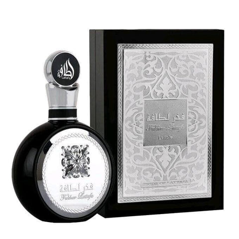 Fakhar Black 100ml EDP by Lattafa - Top notes: Apple, Bergamot, Ginger  Heart notes : Lavender, Sage, Juniper Berries, Geranium  Base notes: Tonka Beans, Amberwood, Cedar, Vetiver