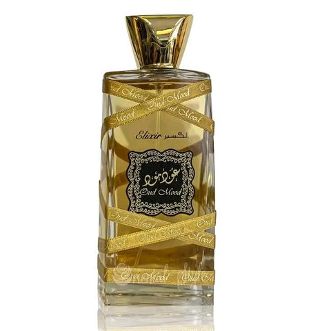 Oud Mood Elixir Perfume 100ml EDP by Lattafa - Top Notes: Saffron, Nutmeg, Cinnamon  Middle Notes: Suede, Sandalwood, Oud  Base Notes: Amber, Vanilla