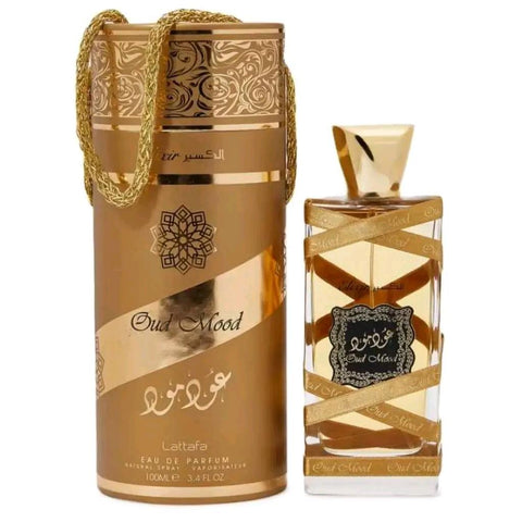 Oud Mood Elixir Perfume 100ml EDP by Lattafa - Top Notes: Saffron, Nutmeg, Cinnamon  Middle Notes: Suede, Sandalwood, Oud  Base Notes: Amber, Vanilla