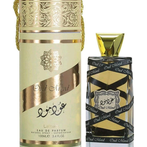 Oud Mood Gold 100ml EDP by Lattafa - Top Notes: Citrus and Spice  Middle Notes: Rose, Dry Birch, Caramel, Oud, Jasmine and Patchouli  Base Notes: Musk, Oakmoss, Oud, Ambergris and Vanilla