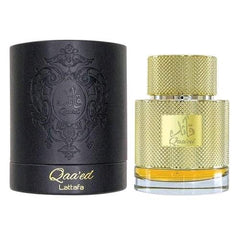 Qaa'ed 100ml EDP  by Lattafa Perfumes - Top notes: Cinnamon, Cardamom and Bergamot  Middle notes: Saffron, Sandalwood, Cedar and Carnation  Base notes: Vanilla, Agarwood (Oud), Leather and Amber